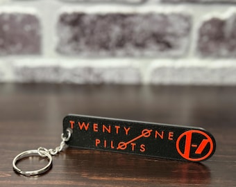 21 Pilots Key Chain. 4” long, 1” wide, 3/16” thick. 3D printer with multicolor plastic! includes chain and ring