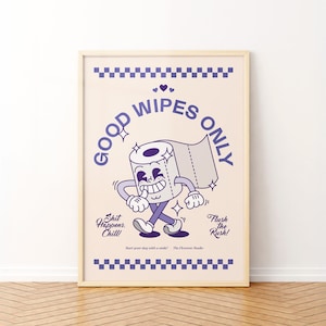 May include: A framed poster with a cartoon toilet paper roll character in purple and white. The text "GOOD WIPES ONLY" is above the character. Below the character are the phrases "Shit Happens. Chill!" and "Flush the Rush!"