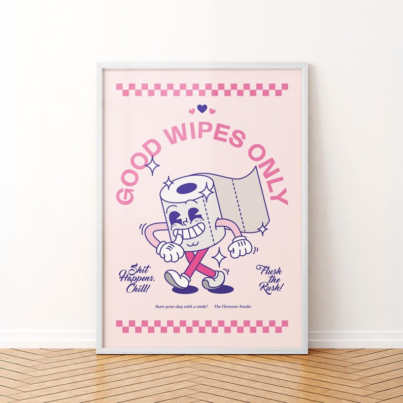 May include: A framed poster with a pink background features a cartoon toilet paper roll with arms and legs, smiling and walking. The text "GOOD WIPES ONLY" arches above the character. Additional text includes "Shit Happens. Chill!" and "Flush the Rush!"