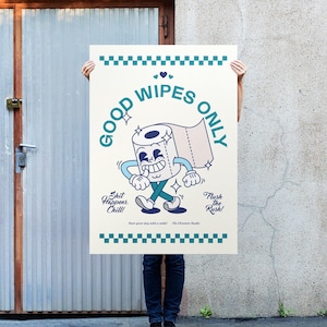 May include: A poster with a cartoon toilet paper roll character with the text "GOOD WIPES ONLY" in teal. The poster also includes the phrases "Shit Happens. Chill!" and "Flush the Rush!"