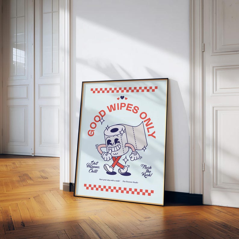 May include: A framed poster with a cartoon toilet paper roll character that reads "Good Wipes Only." The poster has a light blue background with red accents and the phrases "Shit Happens, Chill!" and "Flush the Rush!"