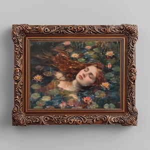 May include: A framed painting of a woman with long red hair floating in a pond with water lilies. The woman is asleep with her eyes closed. The painting is in a dark brown ornate frame.