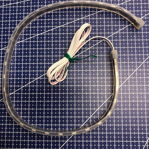 RGB Pixel 5 Volt WS2812 compatible addressable LED strip 19.6&quot; (.5m) x 30 LEDs (5mmx5mm). In weather resistant sleeve.