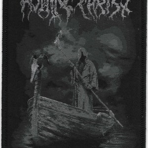 May include: Black and white embroidered patch with the text "ROWING THE CHARIOT" in a gothic font. The patch features a skeletal figure in a hooded robe rowing a boat.