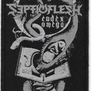 May include: Black and white embroidered patch with the text "Septicflesh Codex Omega" and a graphic of a serpent with a skull-like head.