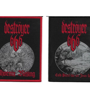 May include: Two black embroidered patches with red stitching. The left patch features the text "Destroyer 666 Phoenix Rising" in red and a gray and white image of a phoenix. The right patch features the text "Destroyer 666 Cold Steel for an Iron Age" in red and a gray and white image of a figure.