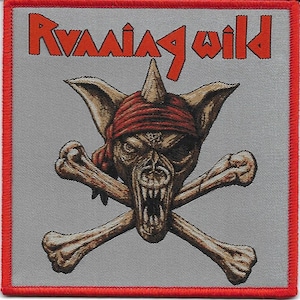 May include: A square patch with a red border features the text "RUNNING WILD" in orange letters above a skull-like creature wearing a red bandana and eyepatch, with crossed bones below. The background is gray.