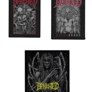May include: Three black and white embroidered patches with the band name "Desiccated" in red, white, and yellow lettering. The patches feature different images of a creature with a skull-like face.
