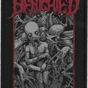 May include: Black and red embroidered patch with the word "Drowned" in red and a black and white image of a creature with a large head and long arms.