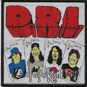 May include: Embroidered patch featuring the band name "DRI" in large red letters. Below, four playing cards depict caricatures with the word "Joker." The phrase "4 of a Kind" is written below the cards.