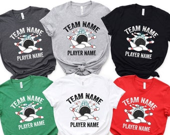 May include: Six t-shirts in different colors with a bowling ball and pins graphic and the text "TEAM NAME PLAYER NAME".