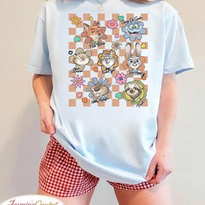 Camiseta con lazo de acuarela de Disney, placa de policía de Zootopia 2, camiseta de Judy Hopps y Nick Wilde, departamento de flores de Zootopia, regalo para fans de Zootopia imagen 3