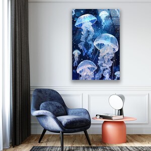 a room with a chair and a painting on the wall