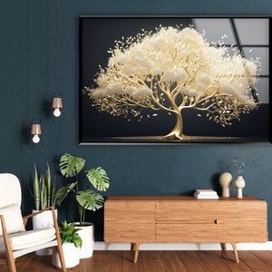 a living room with a painting of a tree on the wall