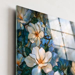 Magnolia wall decor in ivory, cream, aqua, blue, teal, and soft orange tones.