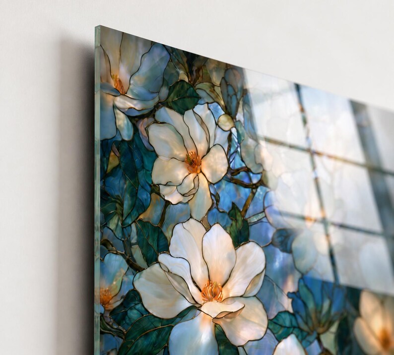 Magnolia wall decor in ivory, cream, aqua, blue, teal, and soft orange tones.