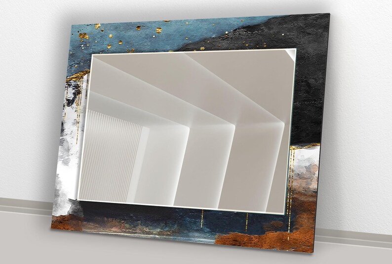 a mirror that is sitting on a wall