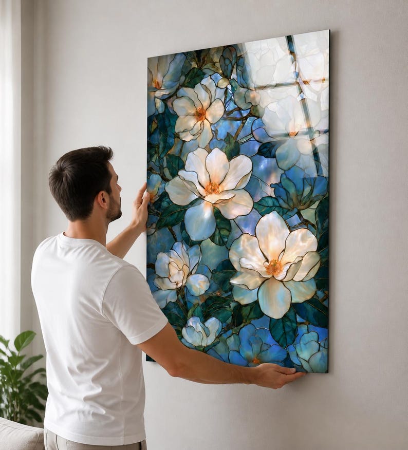 Glossy tempered glass artwork displaying layered white blossoms across a rich blue botanical scene.
