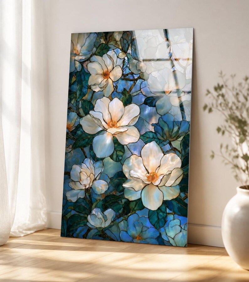 Stained-glass-style floral wall art with cream petals, dark outlines, and teal leaves.