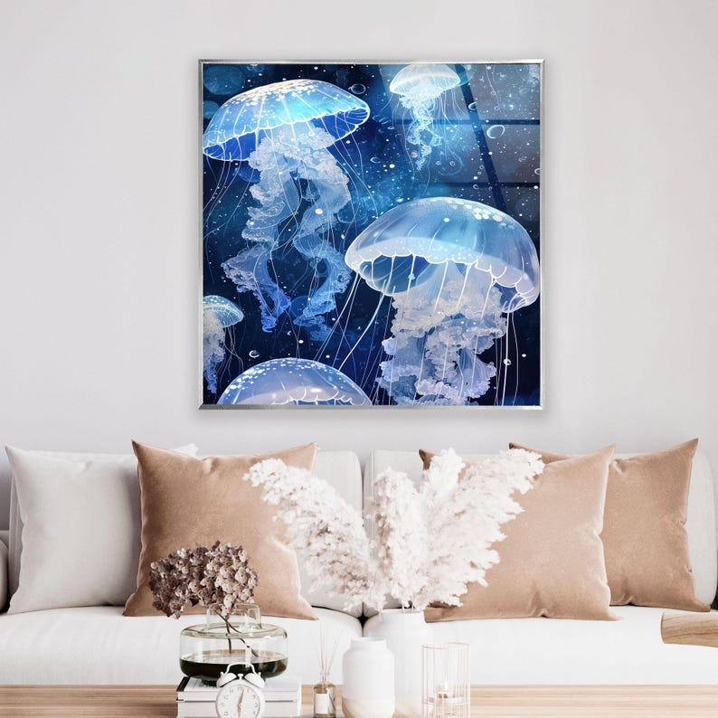 a living room filled with furniture and a painting on the wall