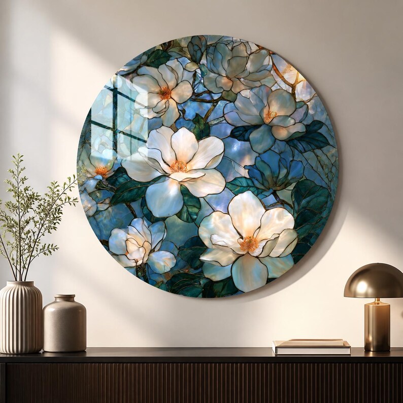 Blue botanical wall art with luminous cream flowers in a stained-glass-inspired printed style.