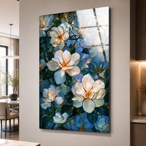 Vertical botanical artwork featuring large white flowers with glowing warm orange centers.