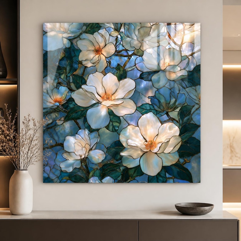 Vertical floral tempered glass art featuring large white blossoms and deep green foliage.
