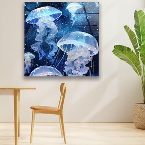 a room with a chair and a painting of jellyfish