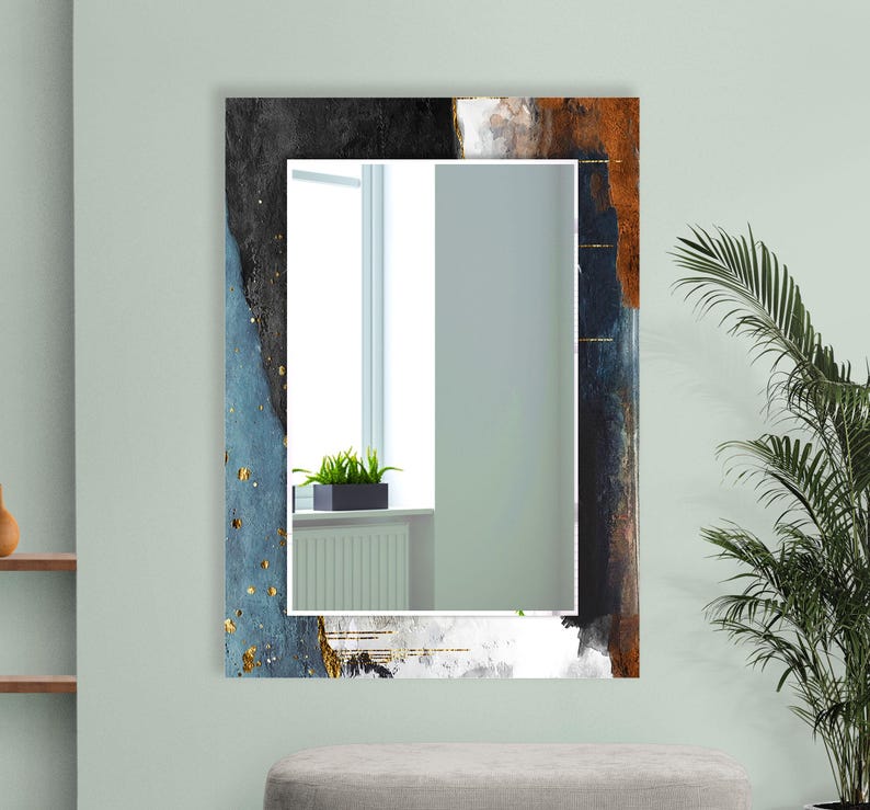 a mirror on a wall with a plant in it