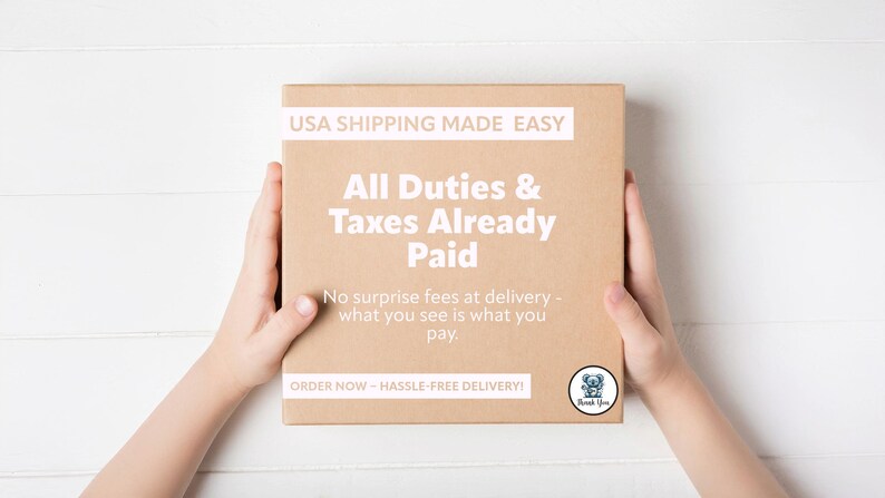 May include: A rectangular cardboard box with white text that reads "USA SHIPPING MADE EASY", "All Duties & Taxes Already Paid", and "No surprise fees at delivery - what you see is what you pay." The box is held by two hands.