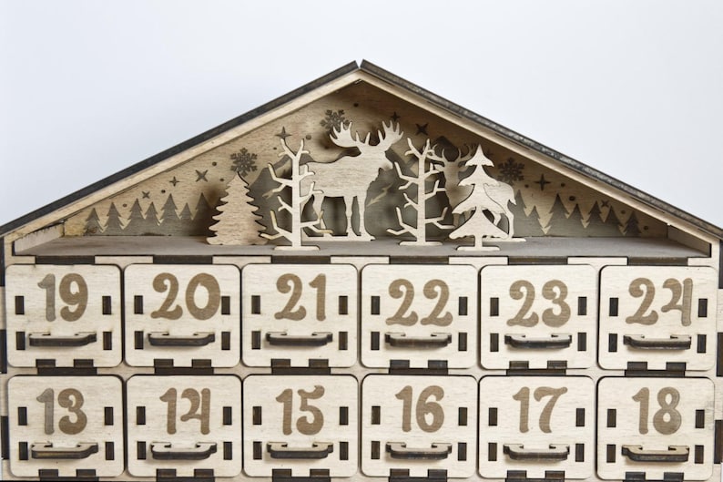 Standard, unpainted, assembled wooden Christmas calendar with 24 drawers. Suitable for self-painting - close up