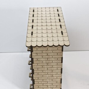 Standard, unpainted, assembled wooden Christmas calendar with 24 drawers. Suitable for self-painting - side view