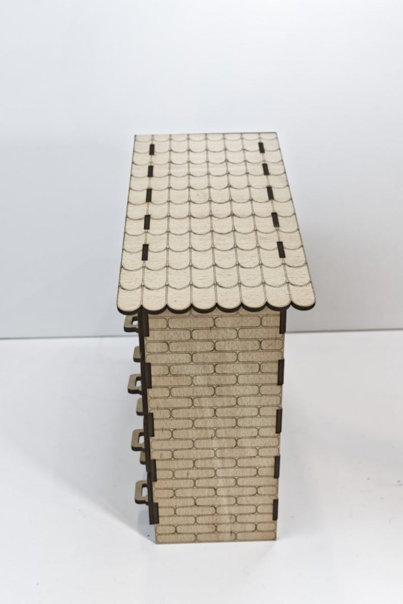 Standard, unpainted, assembled wooden Christmas calendar with 24 drawers. Suitable for self-painting - side view