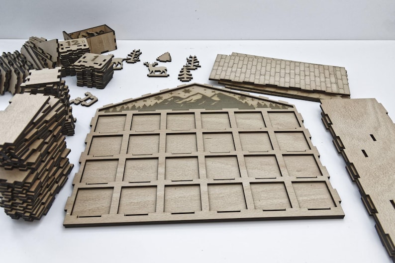 Standard, unpainted, assembled wooden Christmas calendar with 24 drawers. DIY version