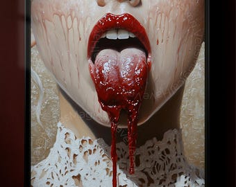 May include: A framed artwork featuring a close-up of a person's open mouth with bright red lips and a blood-red tongue. Red liquid drips from the mouth and face. The person is wearing a white lace collar.