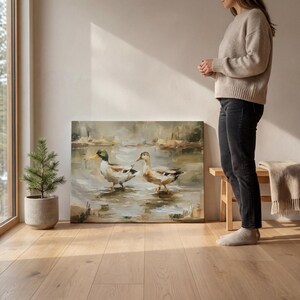 A woman stands in a room with a large painting of ducks on the wall, next to a potted plant and a wooden bench.