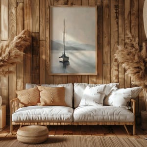 a living room with a couch and a painting on the wall