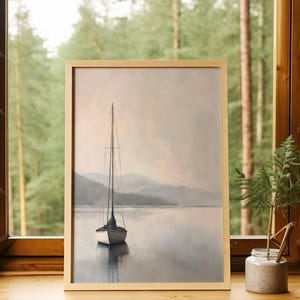 a picture of a sailboat on a lake
