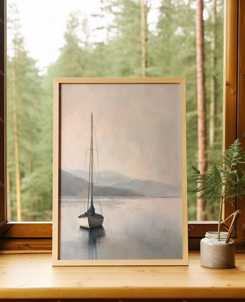 a picture of a sailboat on a lake