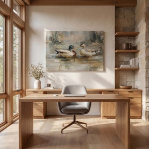 a serene and modern workspace with a large painting of ducks on the wall, a wooden desk with a chair, and a vase of flowers on the desk.