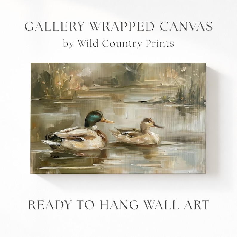 The image is a painting of two ducks swimming in a pond, with a text overlay that reads "Gallery Wrapped Canvas by Wild Country Prints" and "Ready to Hang Wall Art".