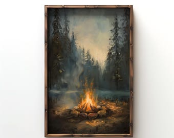May include: A rectangular wall art piece featuring a painting of a campfire surrounded by stones in a dark forest with tall pine trees. The artwork is enclosed in a dark brown wooden frame with visible wood grain, set against a plain white background.