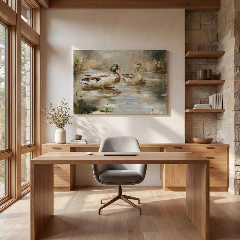 a serene and modern workspace with a large painting of ducks on the wall, a wooden desk with a chair, and a vase of flowers on the desk.