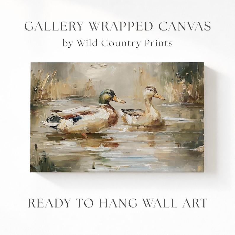 The image is a painting of two ducks swimming in a body of water, with the text "GALLERY WRAPPED CANVAS by Wild Country Prints" and "READY TO HANG WALL ART" below it.