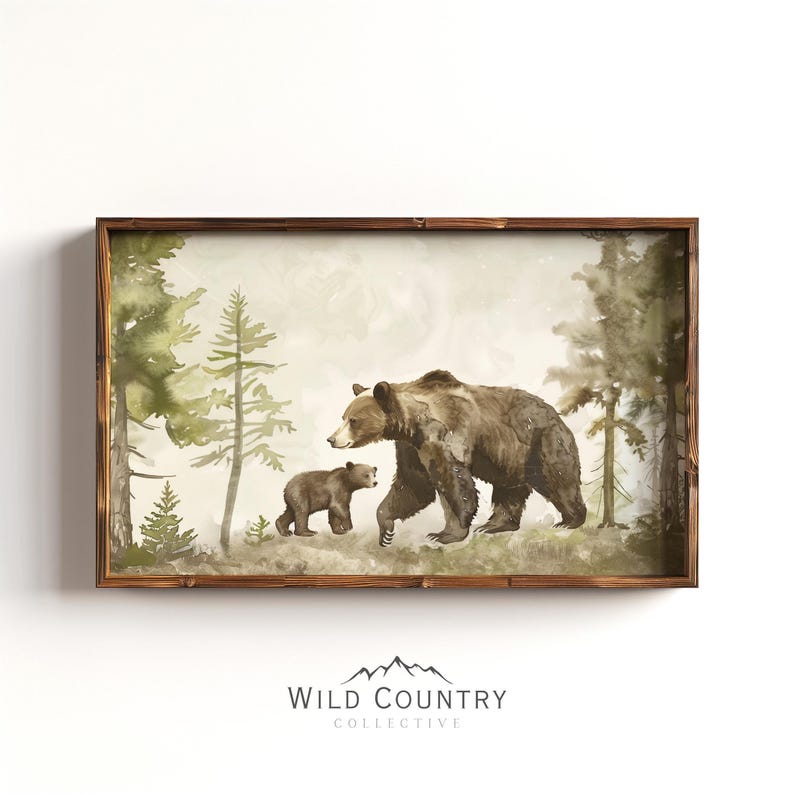 a baby's room with a painting of a bear and a bear cub