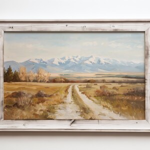 a painting of a dirt road with mountains in the background