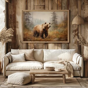 a painting of a brown bear in a rustic living room