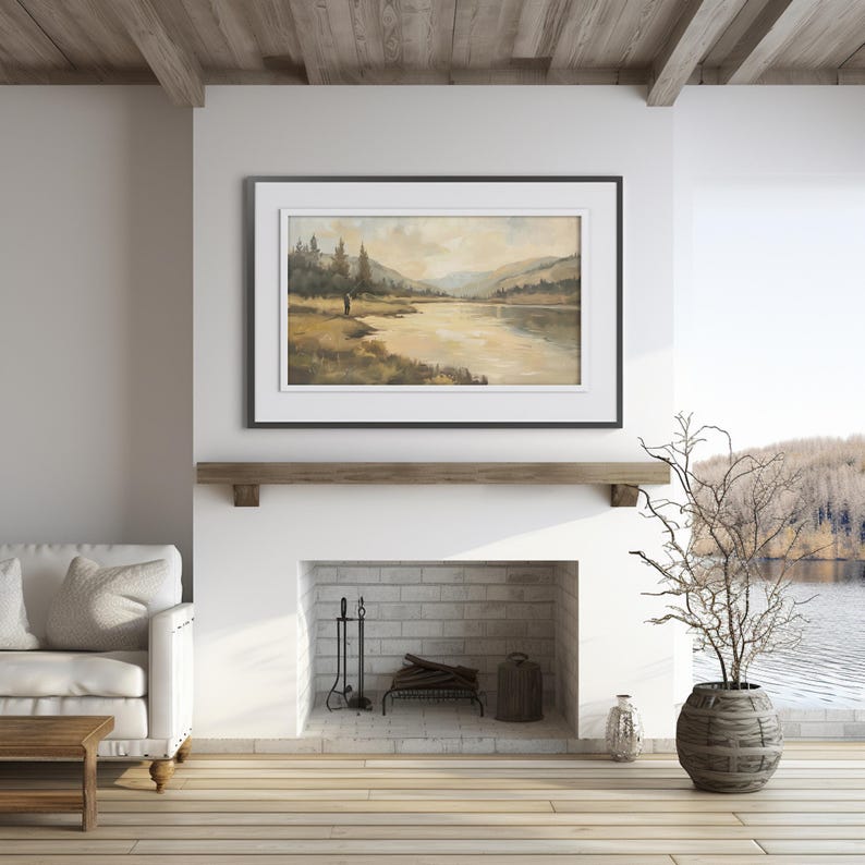 a living room with a fireplace and a painting on the wall