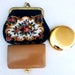 Collection of two vintage purses, petit point upholstery, and gold purse mirror 50s Spain. Spanish antique wallet
