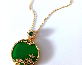 Beautiful Green Asian, Oriental design pendant necklace a traditional Chinese pagoda scene. Delicate rhinestones. Goldplated 24k